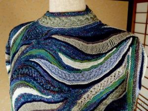 Alphabet needlewoman: knitting a scarf in the art friform