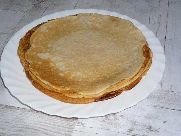 Thin pancakes with sour milk with boiling water