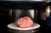 Why you can't defrost meat in the microwave