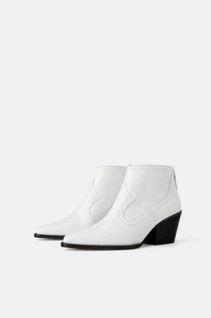Cool boots in cowboy style with the effect of crocodile skin can be purchased at Zara, the price of 7999 rubles. They can be worn with dresses, stylish trousers with leopard print